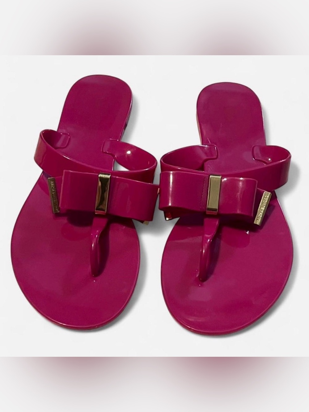 Michael Kors Women's Bow Thong Sandals in Fuchsia size 7.5